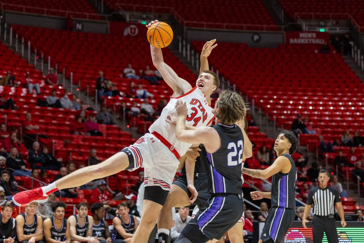 Utah center Lawson Lovering (34) in the exhibition game versus Westminster Griffins at Jon. M. Huntsman Center in Salt Lake City on Nov. 1 2023. (Photo by Mary Allen | The Daily Utah Chronicle)