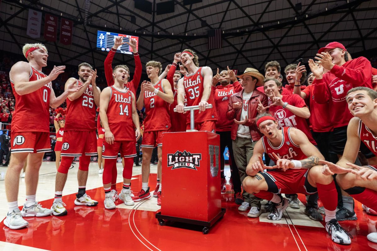 The Runnin’ Utes light the U after defeating the BYU Cougars at Jon M. Huntsman Center in Salt Lake City on Saturday, Dec. 09, 2023. (Photo by Xiangyao “Axe” Tang | The Daily Utah Chronicle)