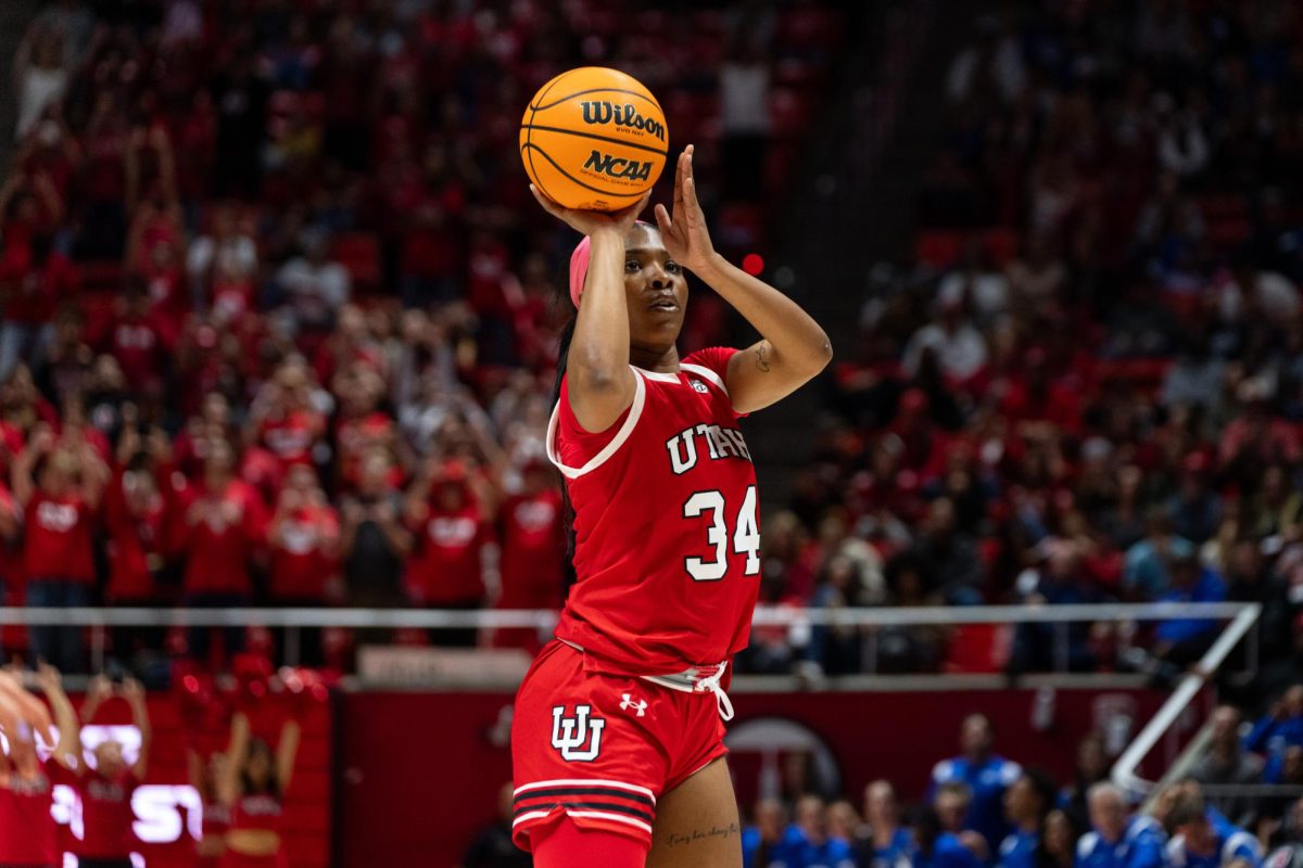 Utah forward Dasia Young (34) versus the BYU Cougars at Jon M. Huntsman Center in Salt Lake City on Saturday, Dec. 02, 2023. (Photo by Xiangyao “Axe” Tang | The Daily Utah Chronicle)