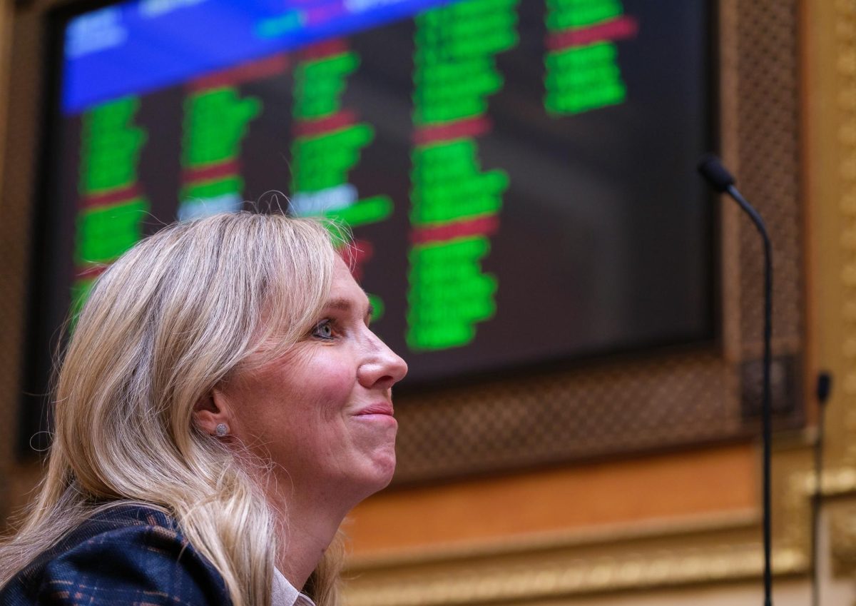 Rep. Katy Hall smiles after H.B. 261 3rd Substitute officially passes in the House Chamber at the Utah State Capitol in Salt Lake City on Friday, Jan. 19, 2024. (Photo by Marco Lozzi | The Daily Utah Chronicle)
