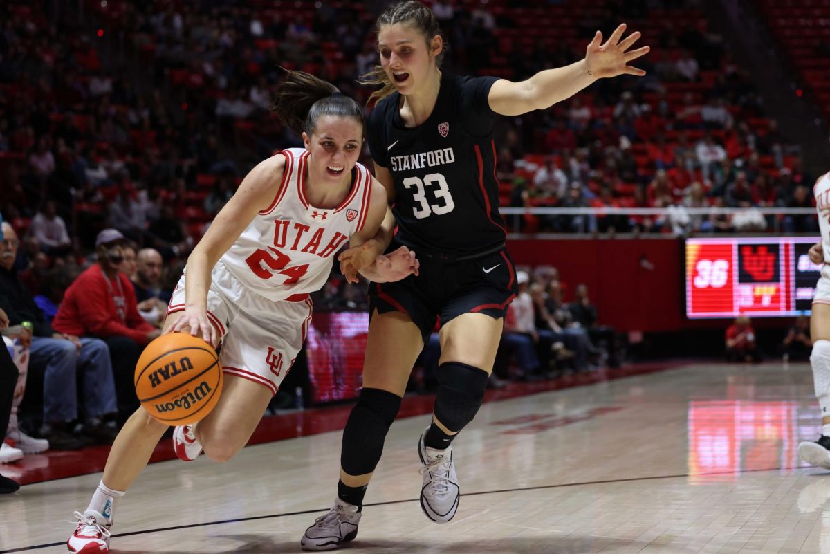 Utah guard Kennady McQueen (24) dribbles in the game versus the Stanford Cardinal at the Jon M. Huntsman Center in Salt Lake City on Friday, Jan. 12, 2024. (Photo by Sarah Karr | The Daily Utah Chronicle)