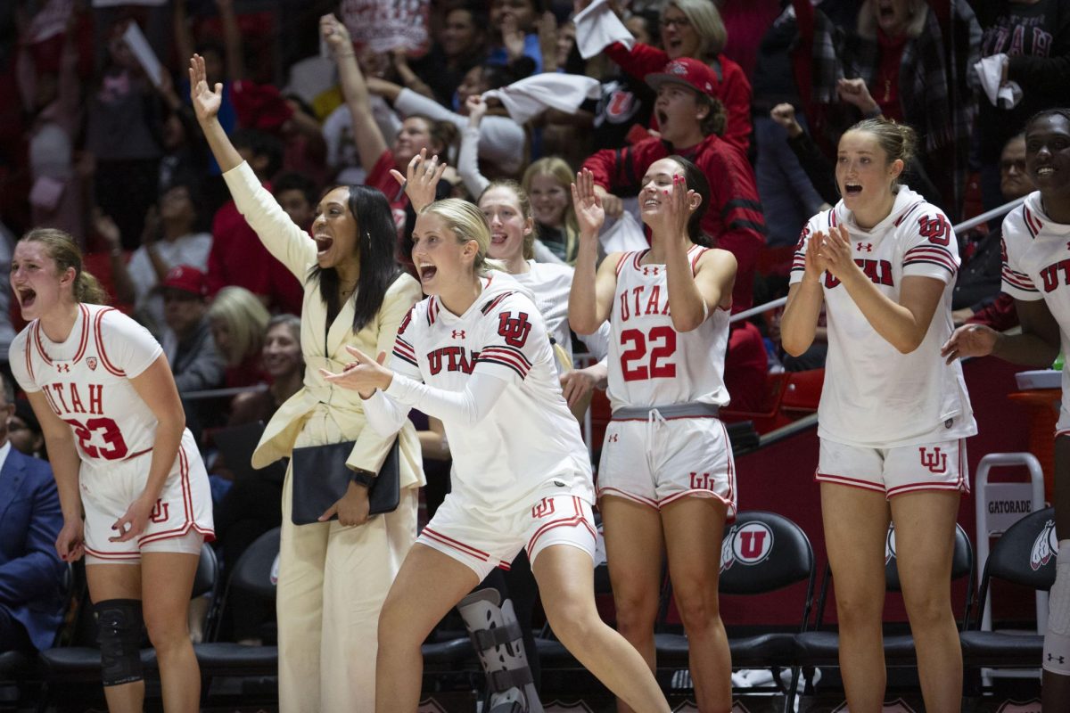 The Utah women’s basketball team celebrates a basket against the USC Trojans at the Jon M. Huntsman Center in Salt Lake City on Jan. 19, 2024. (Photo by Sarah Karr | The Daily Utah Chronicle)