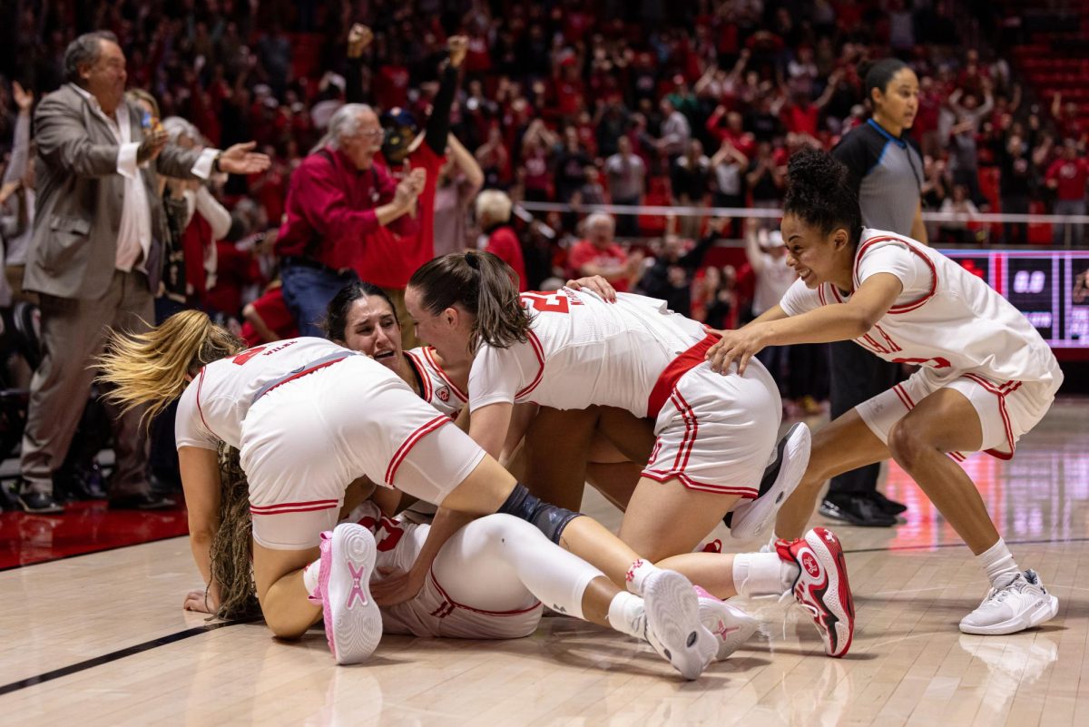 The Utah women’s basketball celebrates after the win against the Colorado Buffaloes at the Jon M. Huntsman Center in Salt Lake City on Friday, Feb. 16, 2024. (Photo by Madeline Van Wagenen | The Daily Utah Chronicle)