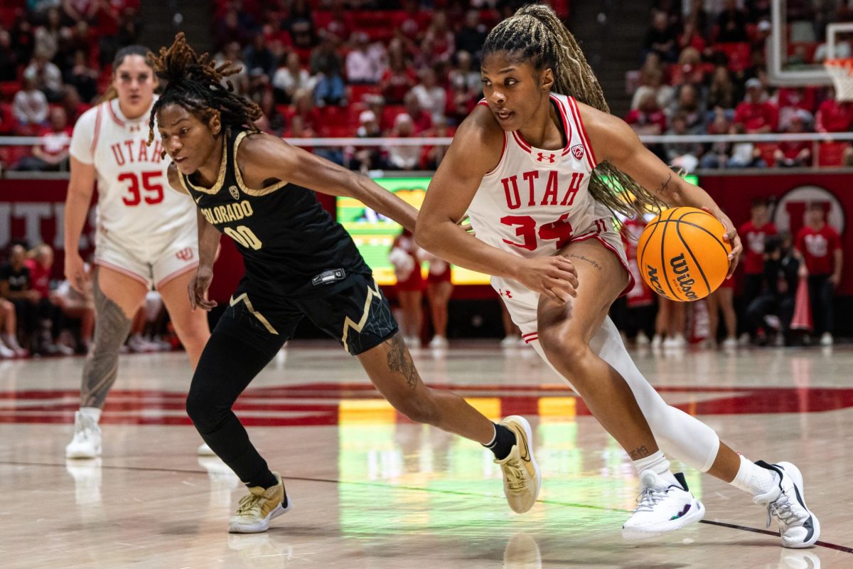 Utah forward Dasia Young (34) versus the Colorado Buffaloes at the Jon M. Huntsman Center in Salt Lake City on Friday, Feb. 16, 2024. (Photo by Xiangyao “Axe” Tang | The Daily Utah Chronicle)