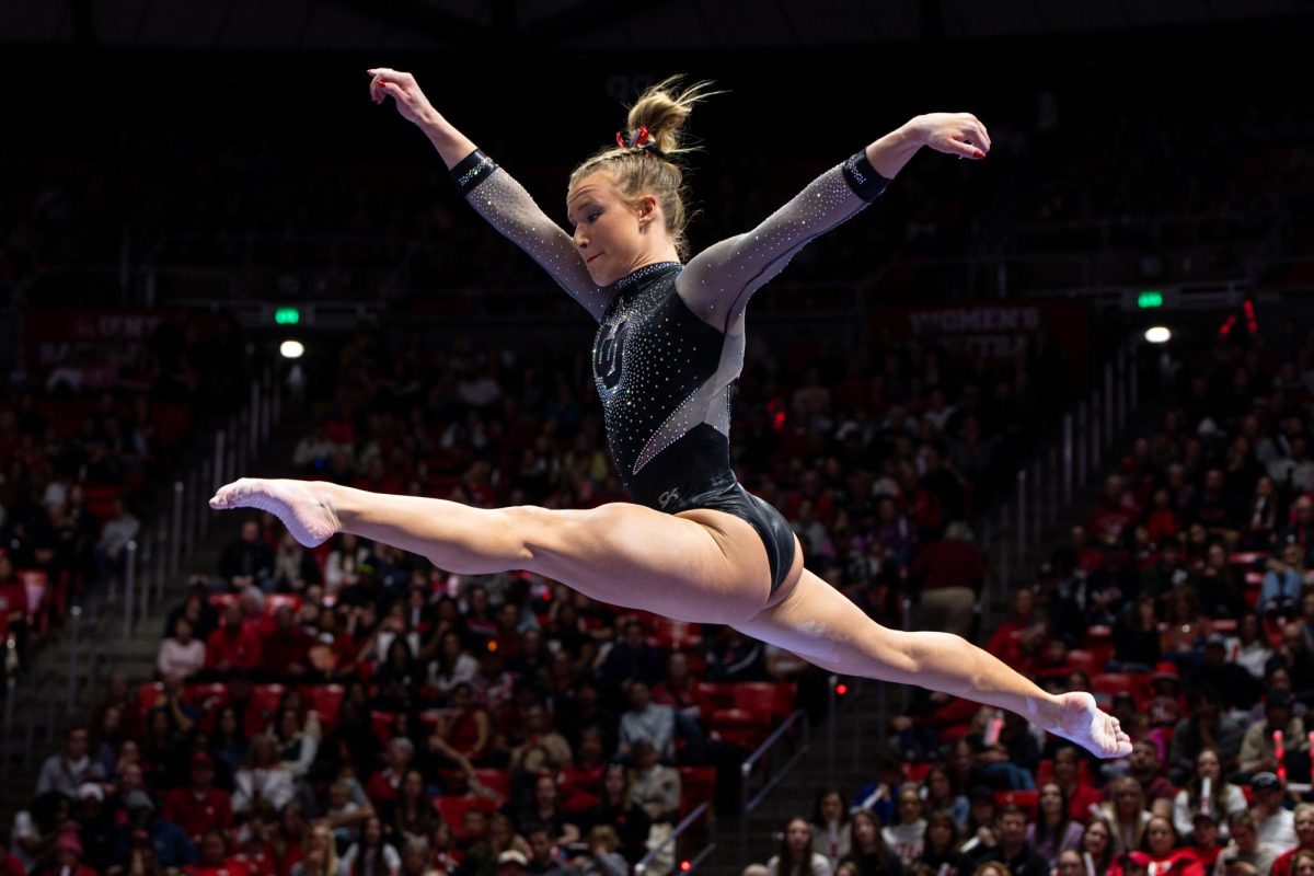 Utah gymnast Abby Paulson in her beam routine versus Stanford Cardinal and Utah State Aggies at the Jon M. Huntsman Center in Salt Lake City on March 15, 2024. (Photo by Xiangyao “Axe” Tang | The Daily Utah Chronicle)
