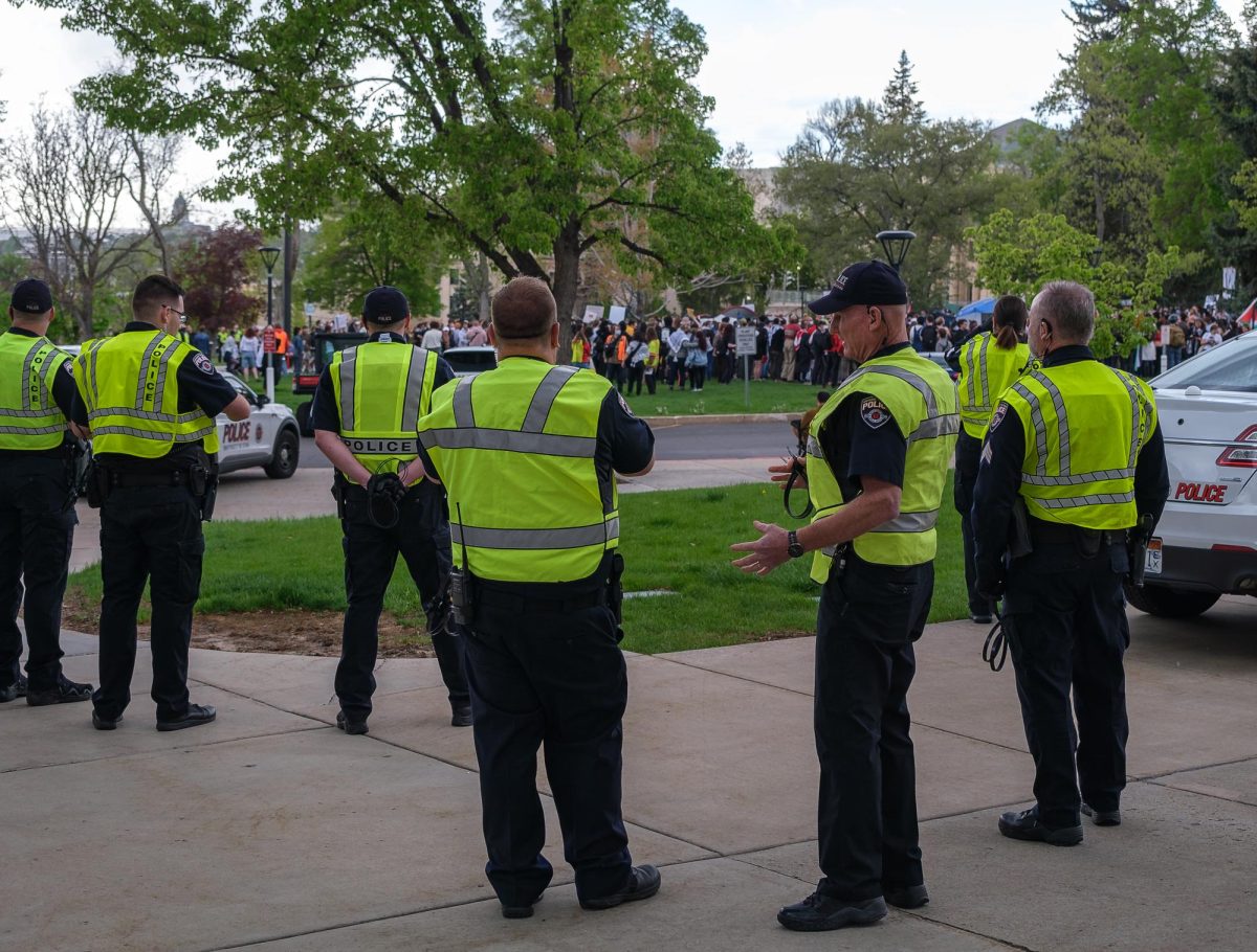 University of Utah police monitor the situation in front of the John R. Park Building at the University of Utah during the Emergency Rally For Palestine on Monday, April 29, 2024. (Photo by Marco Lozzi | The Daily Utah Chronicle)