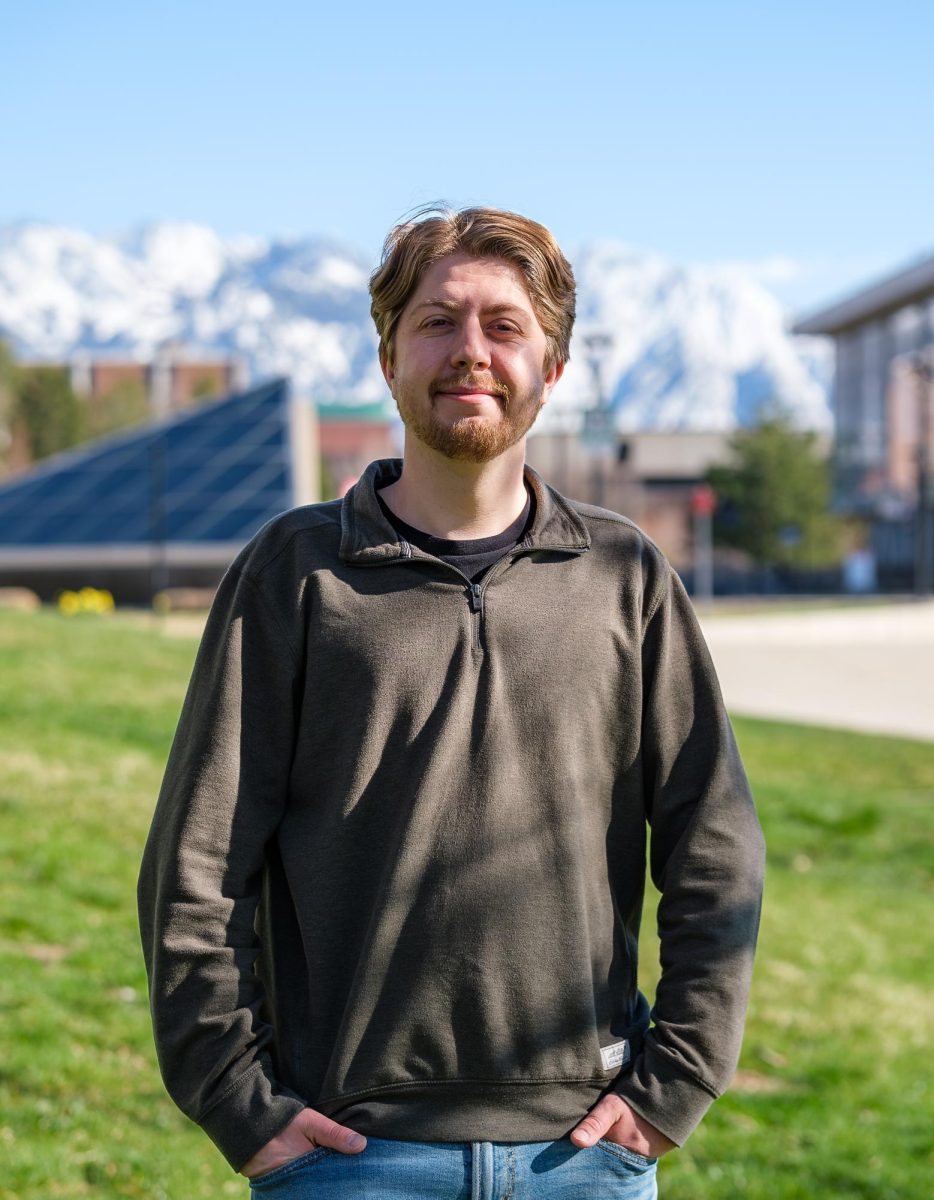 Andrew Christiansen poses for a photo outside the J. Willard Marriott Library on the University of Utah campus in Salt Lake City on April 2, 2024. (Photo by Marco Lozzi | The Daily Utah Chronicle)