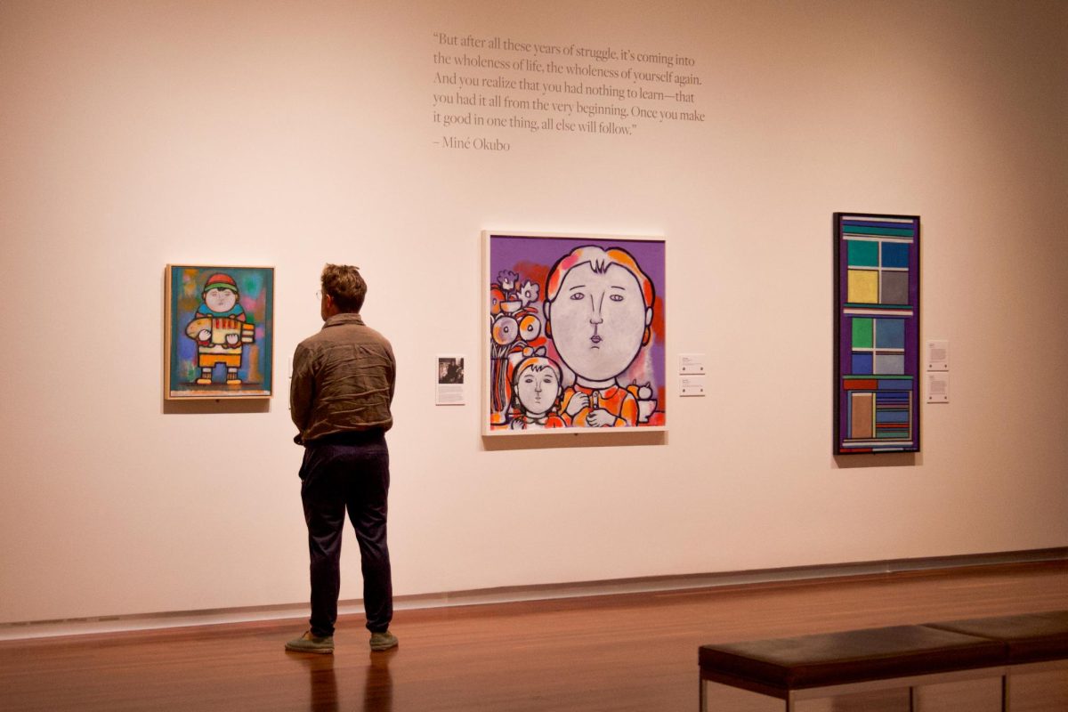 A viewer explores the Pictures of Belonging exhibit in Utah Museum of Fine Arts (UMFA) in Salt Lake City on April 13, 2024. (Photo by Minh Polaris Vuong | The Daily Utah Chronicle)