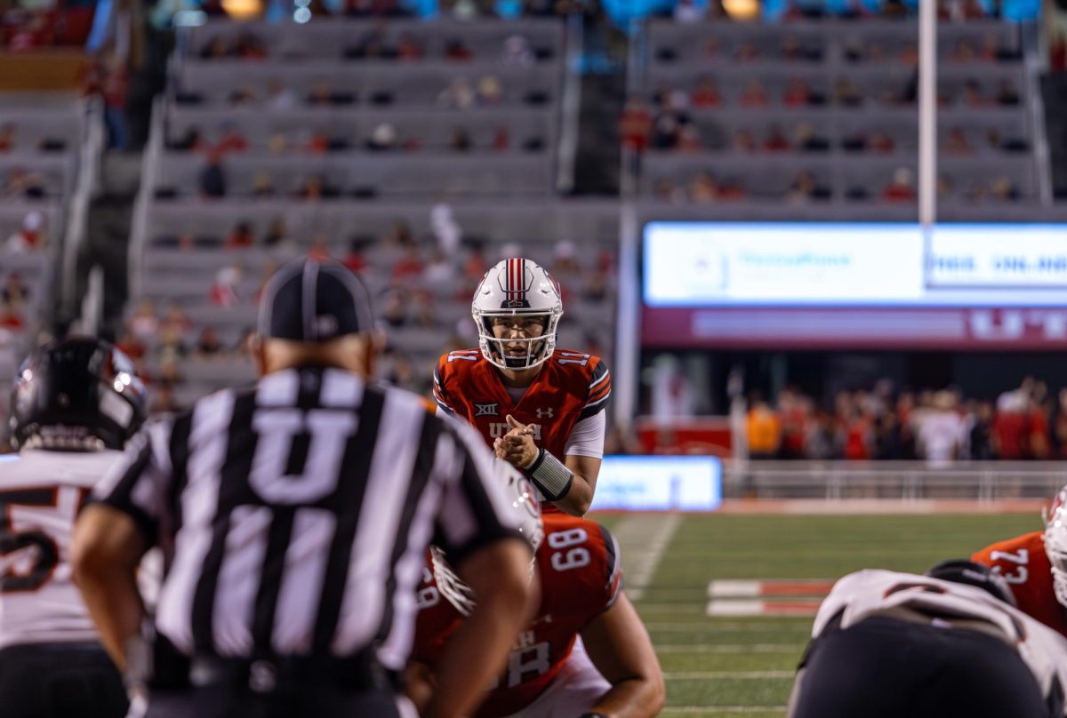 University of Utah Freshman QB Isaac Wilson (#11) during the home opener football game against Southern Utah University at Rice-Eccles Stadium on Aug. 29, 2024. (Photo by Samantha Lazenby | The Daily Utah Chronicle)