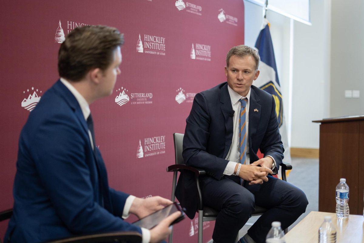 Rep. Blake Moore (left) talks taxes and federal spending with Nic Dunn (right), vice president of strategy and communications for The Sutherland Institute. (Photo courtesy of The Sutherland Institute).