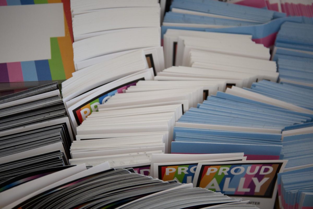 The Student Pride Center, located in Marriott Library, hands out stickers and flyers to support LGBT+ students. (Photo by Addy Cowley | The Daily Utah Chronicle)