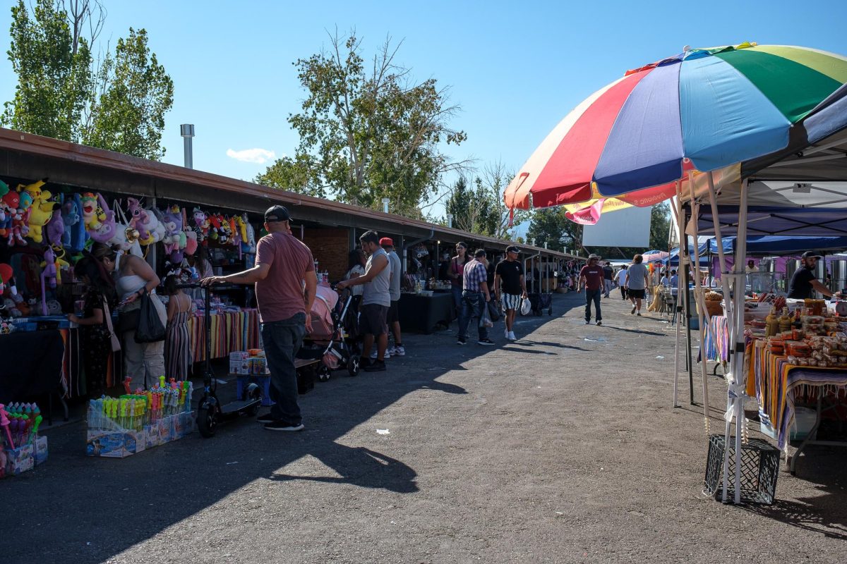 People gather at the Redwood Drive-In that was just voted to be rezoned for housing developments. 