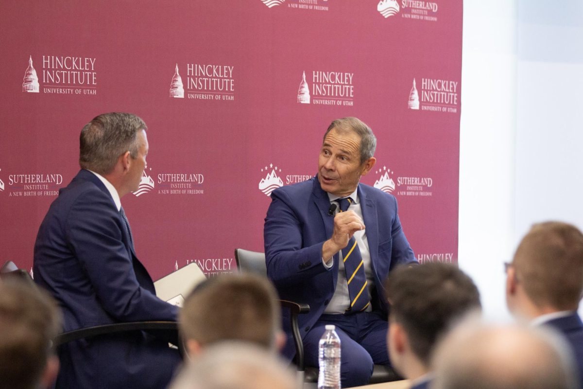 John Curtis talks with Hinckley Institute of Politics Director Jason Perry. Photo courtesy of The Sutherland Institute. 