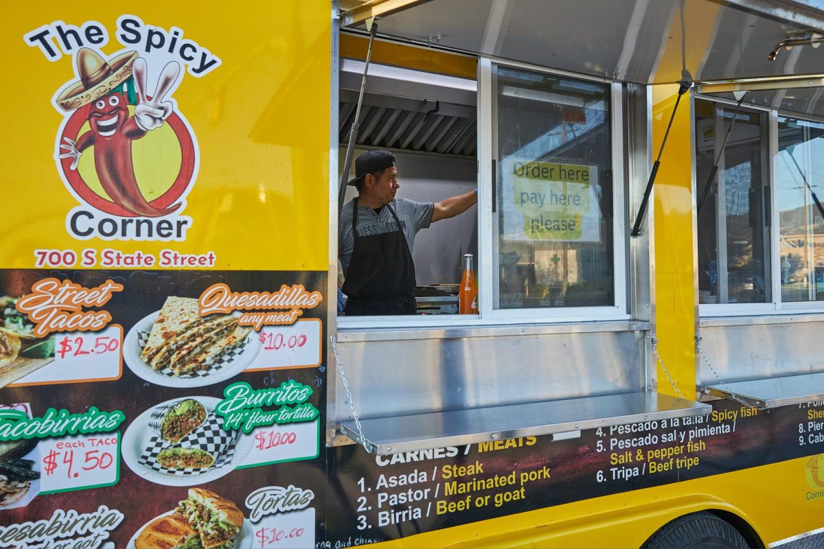 Juan Miguel Moreno, owner and operator of the Tacos Don Rafa food truck, prepares street tacos in the Tacos Don Rafa food truck on the corner of 7th south and State Street in Salt Lake City on Wednesday, Sept. 18, 2024. (Photo by Luke Larsen | The Daily Utah Chronicle)