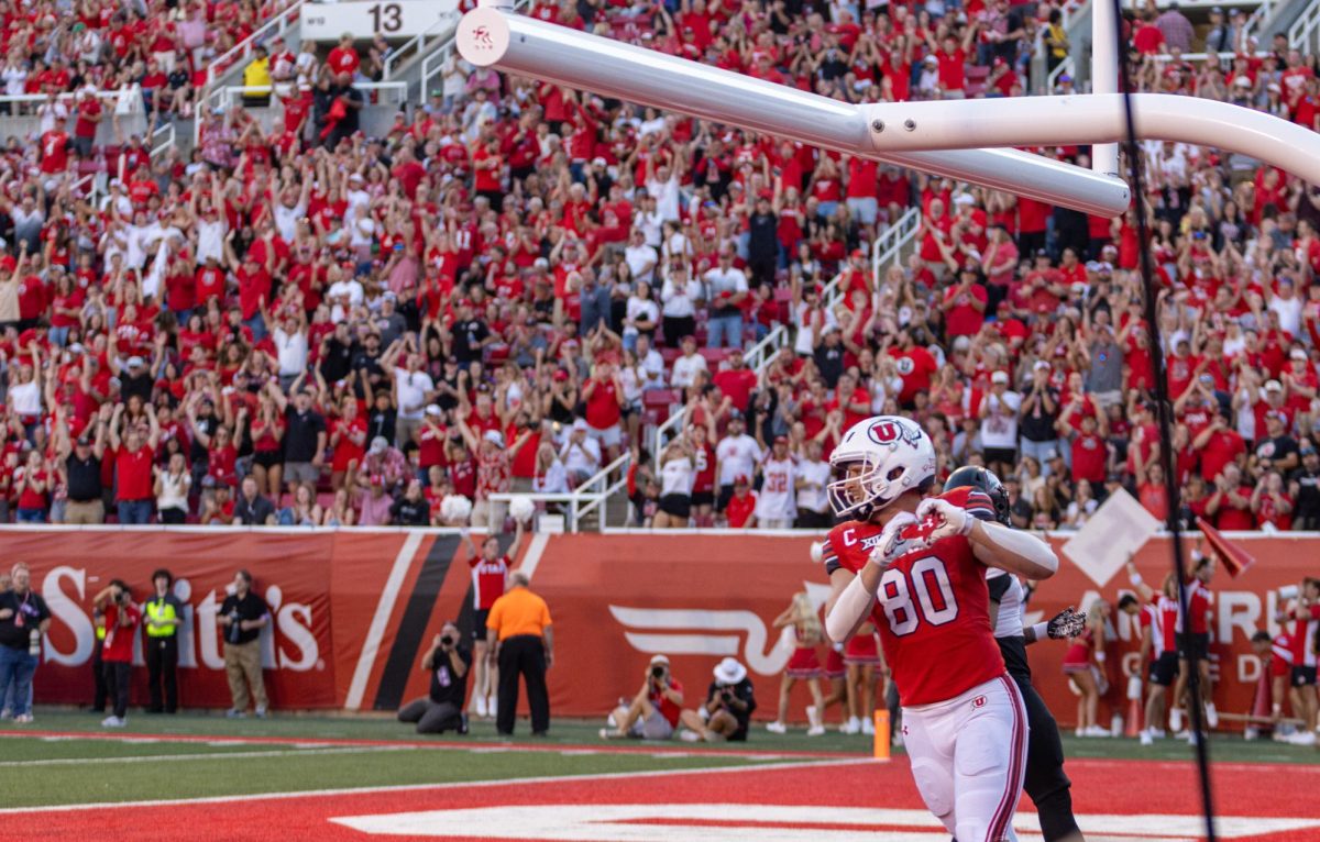 University of Utah tight end Brant Kuithe (80) celebrating a touchdown against Southern Utah University at Rice-Eccles Stadium in Salt Lake City on Aug. 29, 2024. (Photo by Samantha Lazenby | The Daily Utah Chronicle)