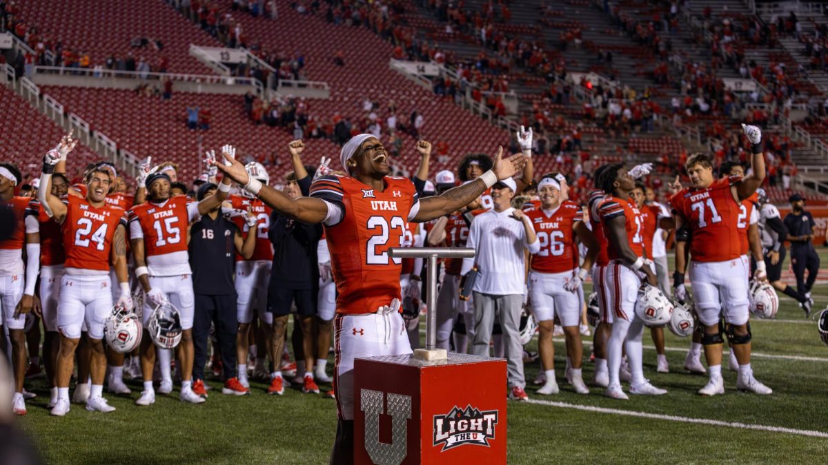 University of Utah running back Dijon Stanley (23) lighting the U after Utah's 49-0 win against Southern Utah University at Rice-Eccles Stadium in Salt Lake City on Aug. 29, 2024. (Photo by Samantha Lazenby | The Daily Utah Chronicle)