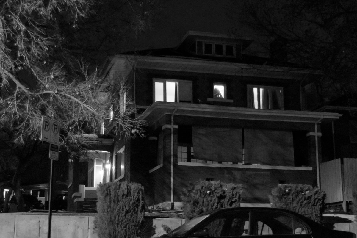 Lights are illuminated inside the Kappa Sigma fraternity house on Jan 23, 2023 in Salt Lake City. (Photo by Jack Gambassi | The Daily Utah Chronicle)