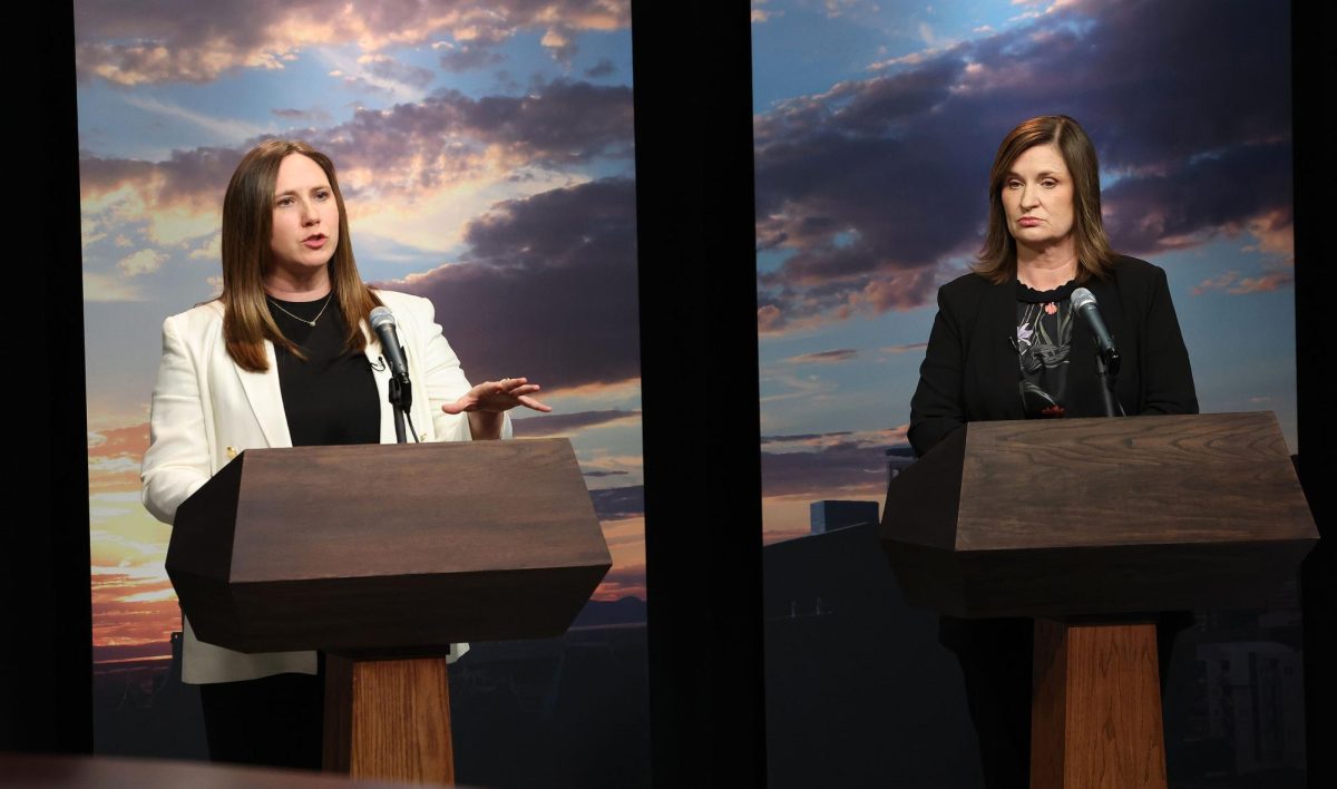 Erin Rider (left) and Jenny Wilson (right) at the Salt Lake County Mayoral Debate on Oct. 3 (Pool photo, Jeffrey D. Allred/Deseret News). 