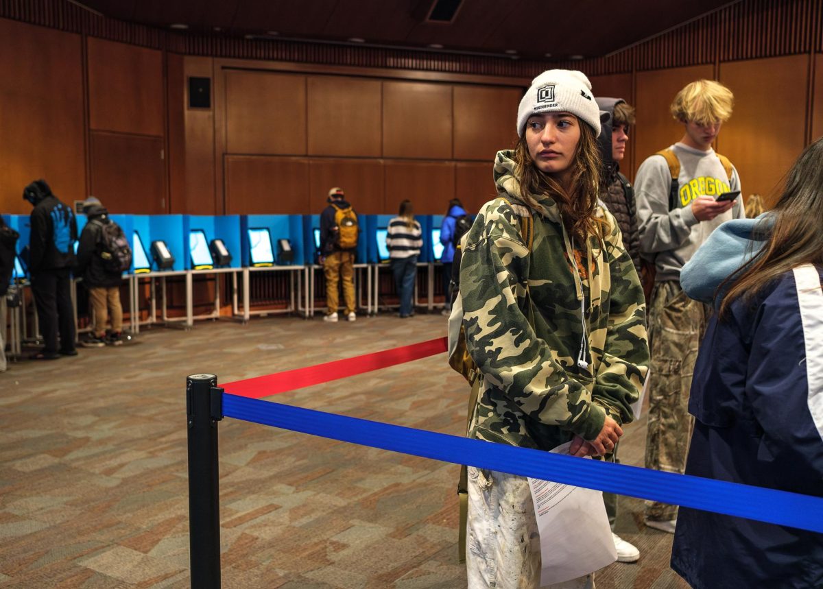 University of Utah student Elaine DeMaggio waits in line to cast her vote at the J. Willard Marriott Library in Salt Lake City on Tuesday, Nov. 5, 2024. (Photo by Marco Lozzi | The Daily Utah Chronicle)