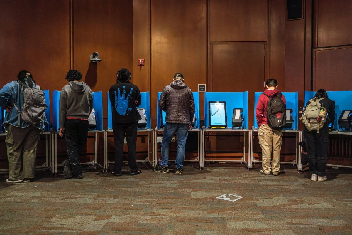 University of Utah students cast their ballots at the J. Willard Marriott Library in Salt Lake City on Tuesday, Nov. 5, 2024. (Photo by Marco Lozzi | The Daily Utah Chronicle)