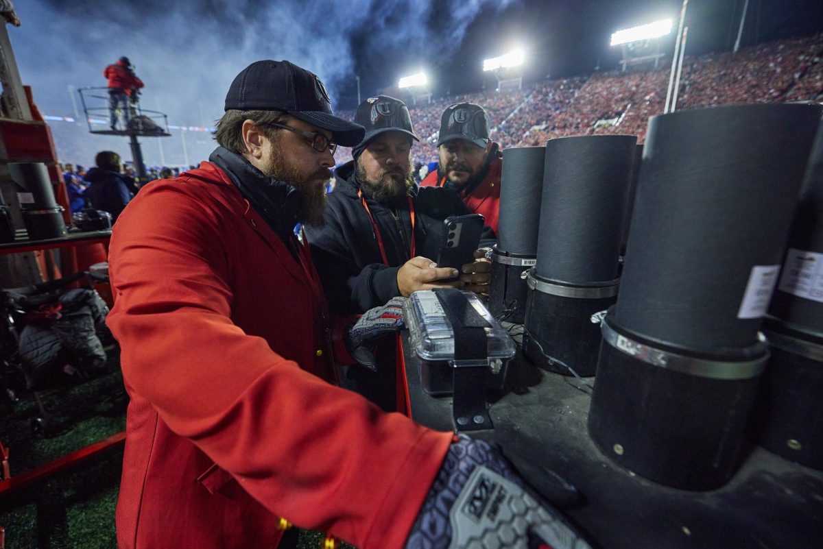 Darren Boekweg (Left), Brady Gabbitas (Center), and Ryan Bigler (Right) relax during the fourth quarter of the U vs. BYU game in the Rice-Eccles Stadium on Saturday, Nov. 9, 2024. (Photo by Luke Larsen | The Daily Utah Chronicle)