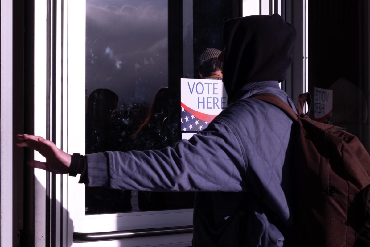 A University of Utah student enters the J. Willard Marriott Library in Salt Lake City on Tuesday, Nov. 5. (Photo by Madeline Van Wagenen | The Daily Utah Chronicle)