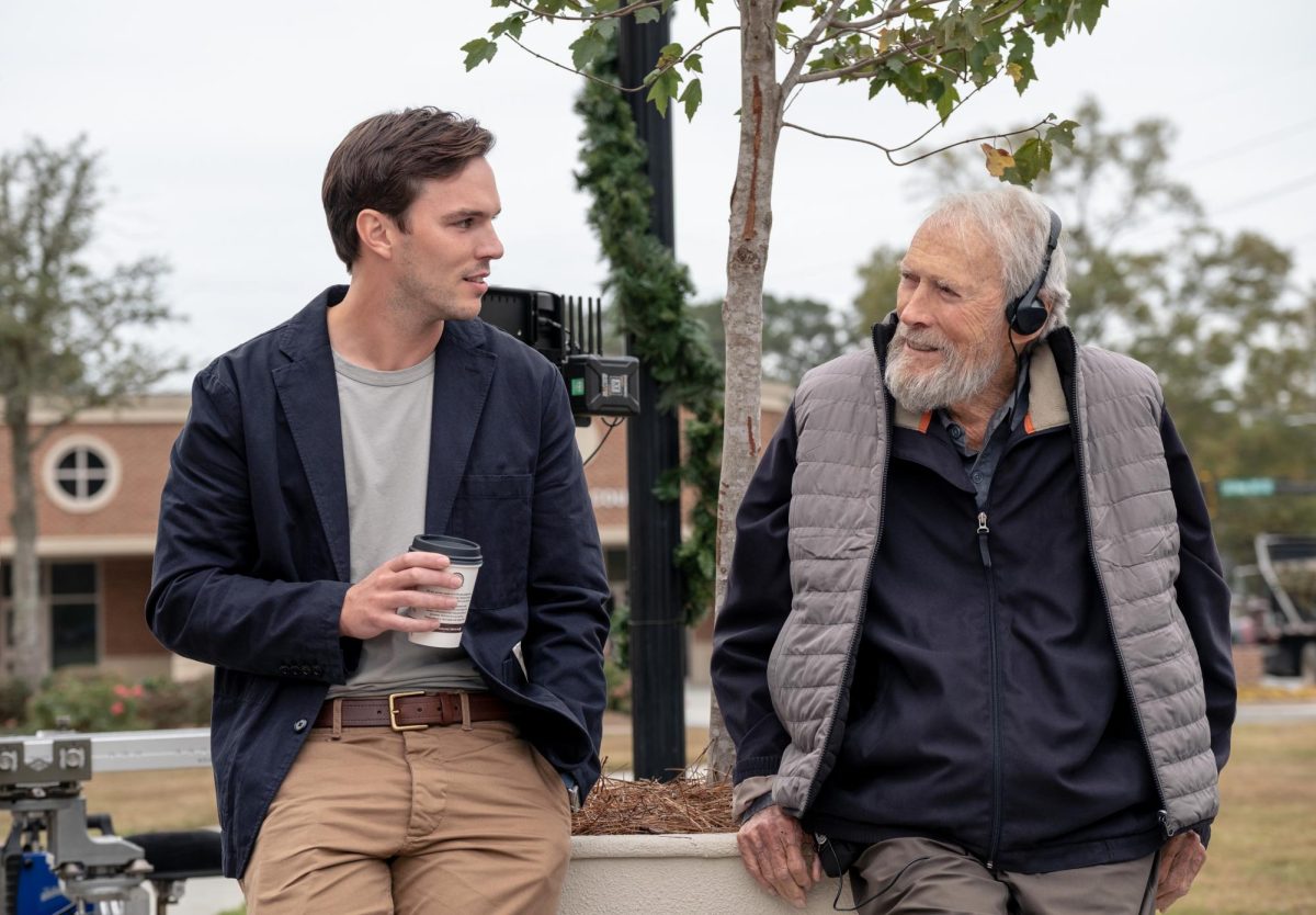 (L to r) NICHOLAS HOULT and director CLINT EASTWOOD on the set of Warner Bros. Pictures’ “JUROR #2,” a Warner Bros. Pictures release.