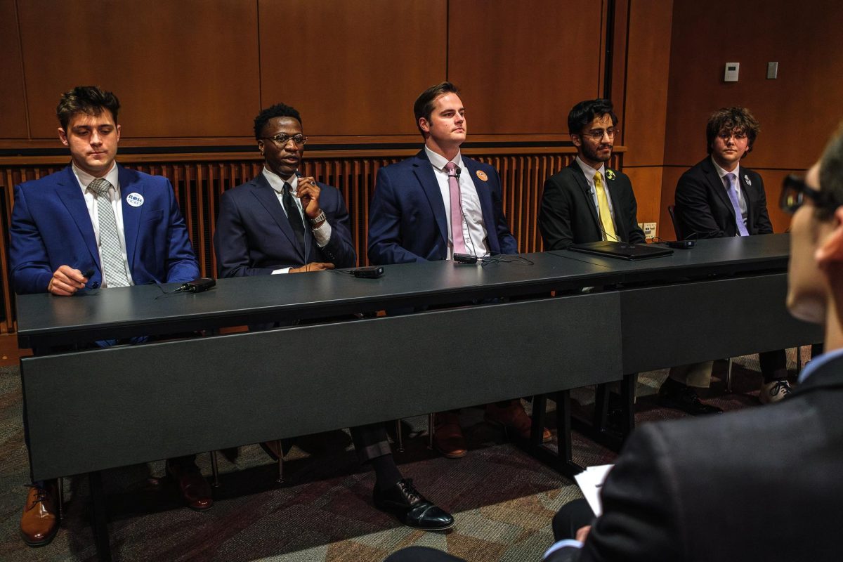 ASUU presidential candidates answer questions during the ASUU Chronicle Debate in the Gould Auditorium at the University of Utah on Tuesday, February 4, 2025. (Photo by Marco Lozzi | The Daily Utah Chronicle)