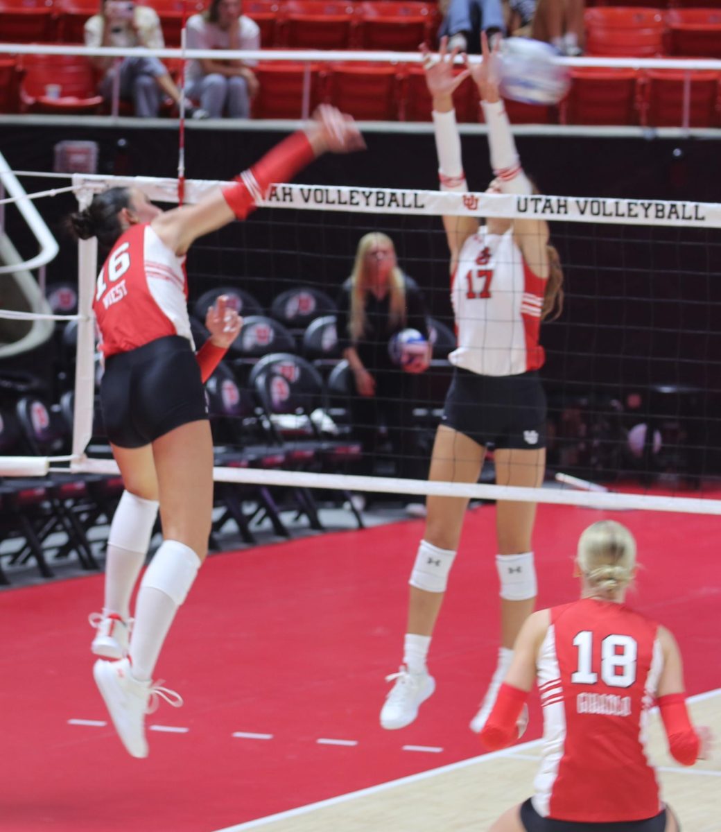 Devyn Wiest goes for the kill in the Red White Match at the Jon M. Huntsman Center on Aug. 23, 2025. (Photo by Sean Stetson | The Daily Utah Chronicle)