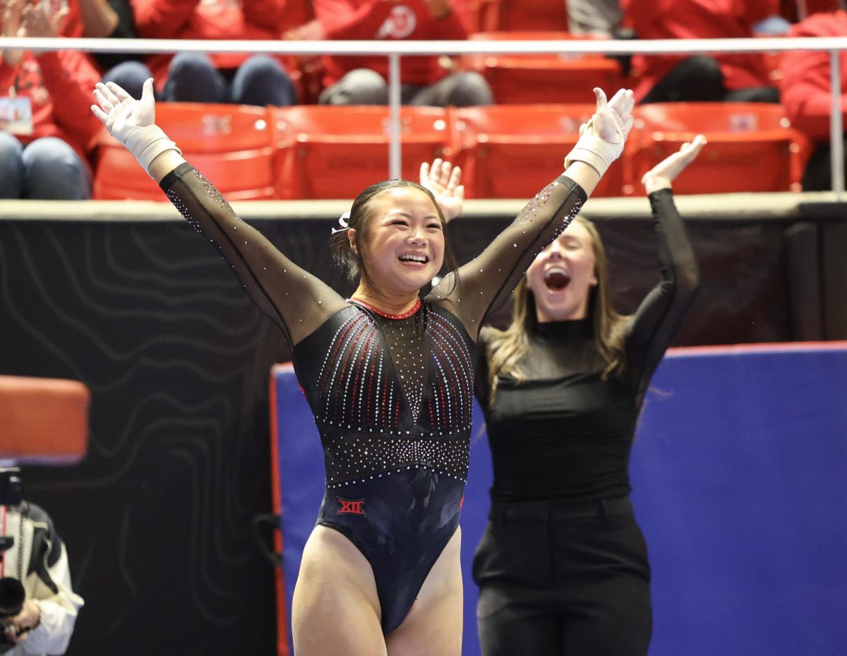 Utah sophomore Zoe Johnson reacts after her vault during a tri-meet against Minnesota and Iowa at the Jon M. Huntsman Center on Friday, Jan. 2, 2026. (Photo by Sean Stetson | The Daily Utah Chronicle)