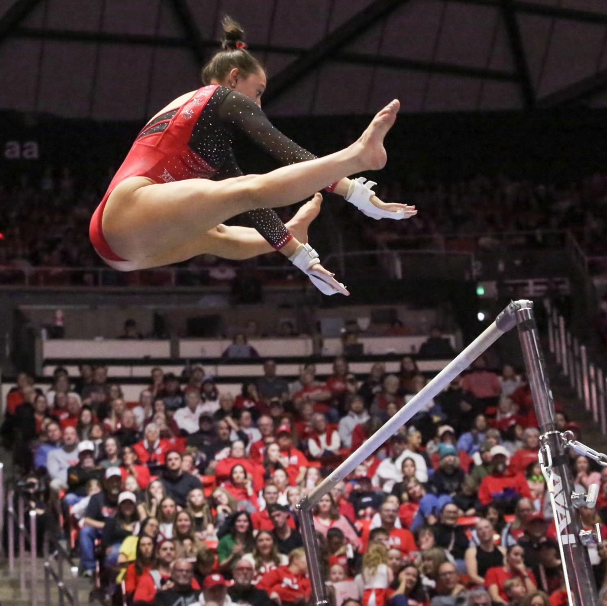 Ella Zirbes on bars against Arizona State Jan 30 at the Jon M. Huntsman Center in Salt Lake City