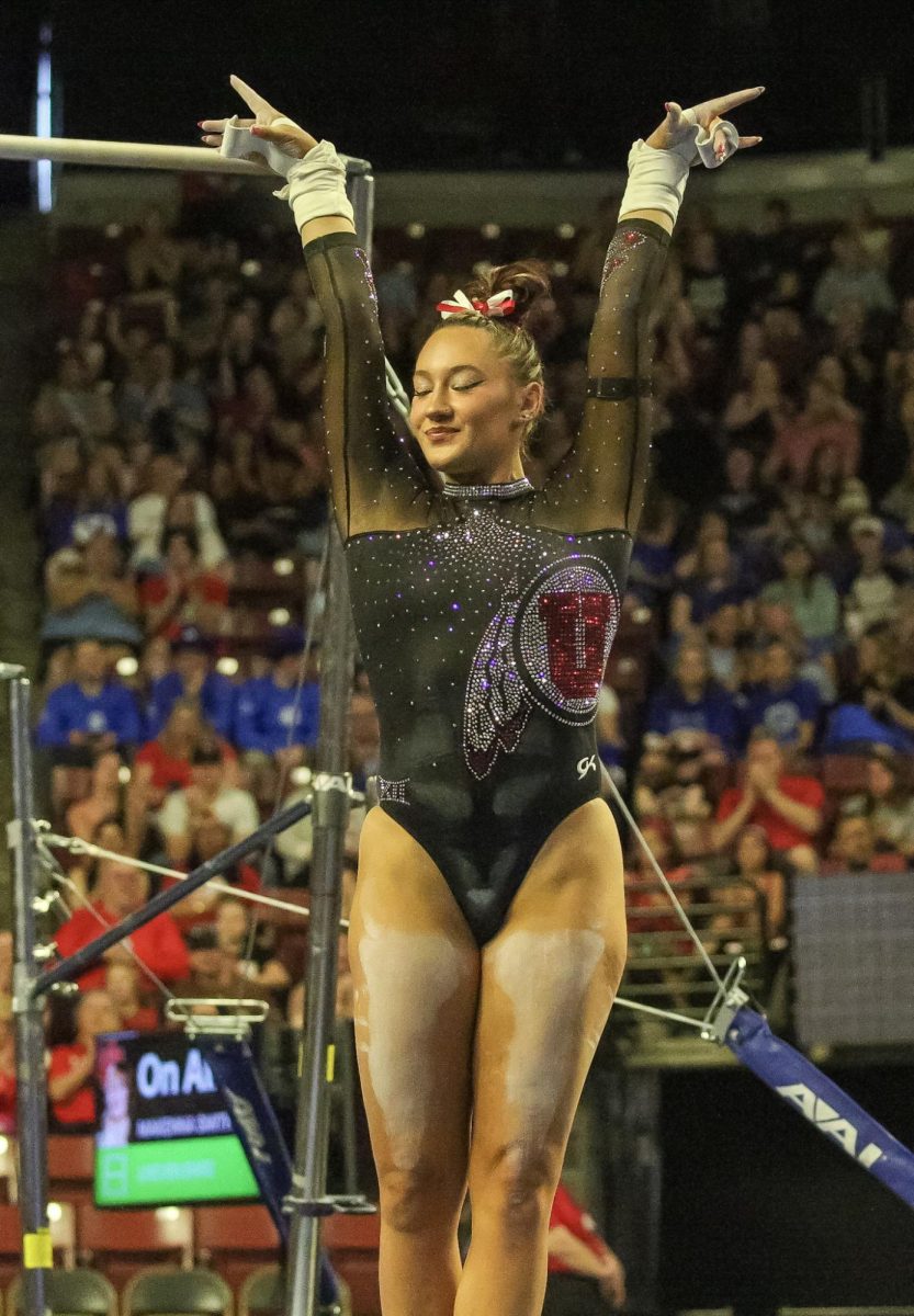 Makenna Smith on bars at the Big 12 Championship at the Maverick Center on March 21, 2026