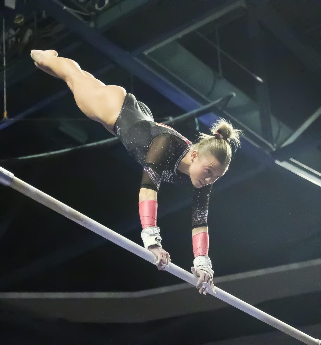 Avery Neff on bars at the Big 12 Championship at the Maverick Center on March 21, 2026