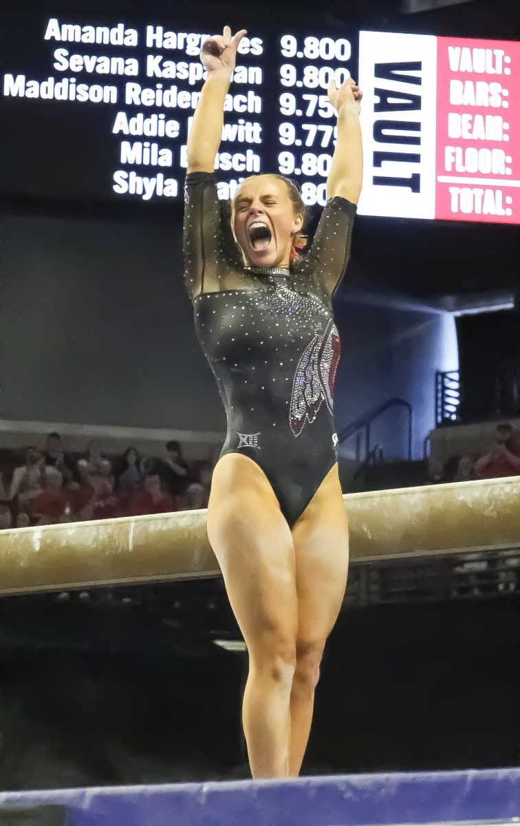 Camie Winger on beam at the Big 12 Championship at the Maverick Center on March 21, 2026