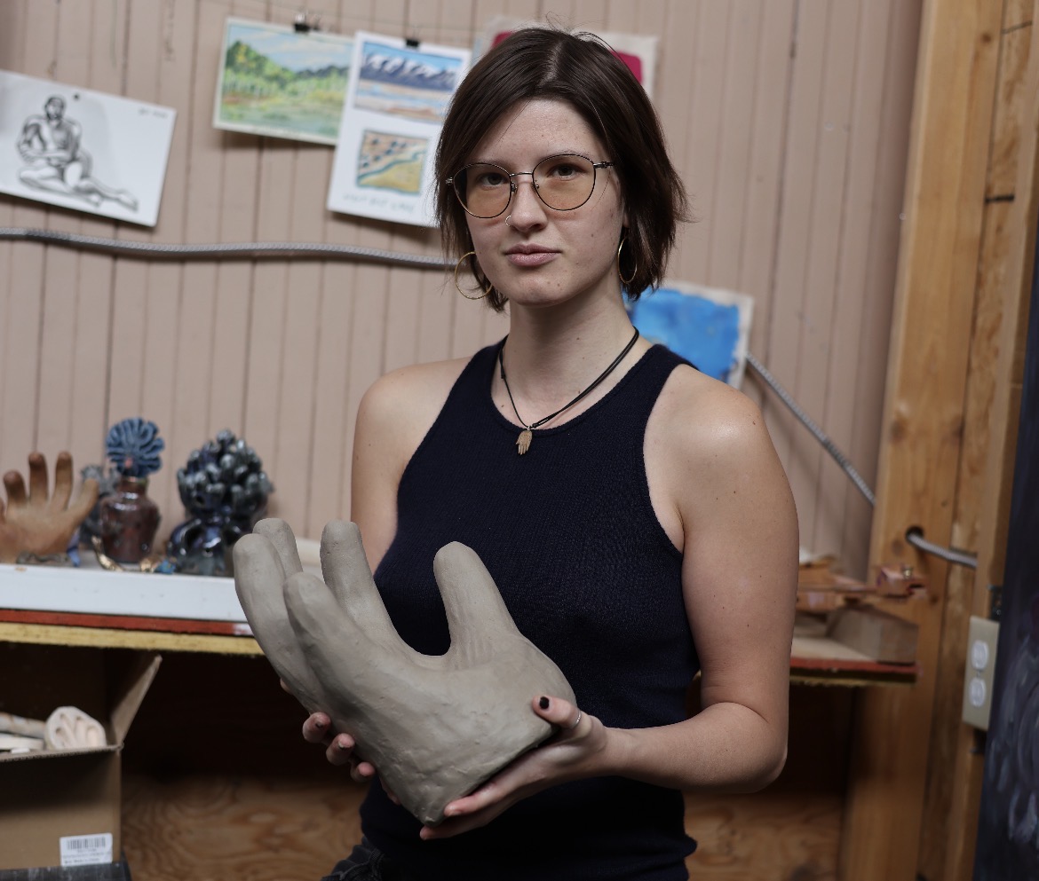 Salt Lake City artist Sophie Nebeker in her studio with one of her sculptures. (Photo courtesy of Lucy Nebeker)