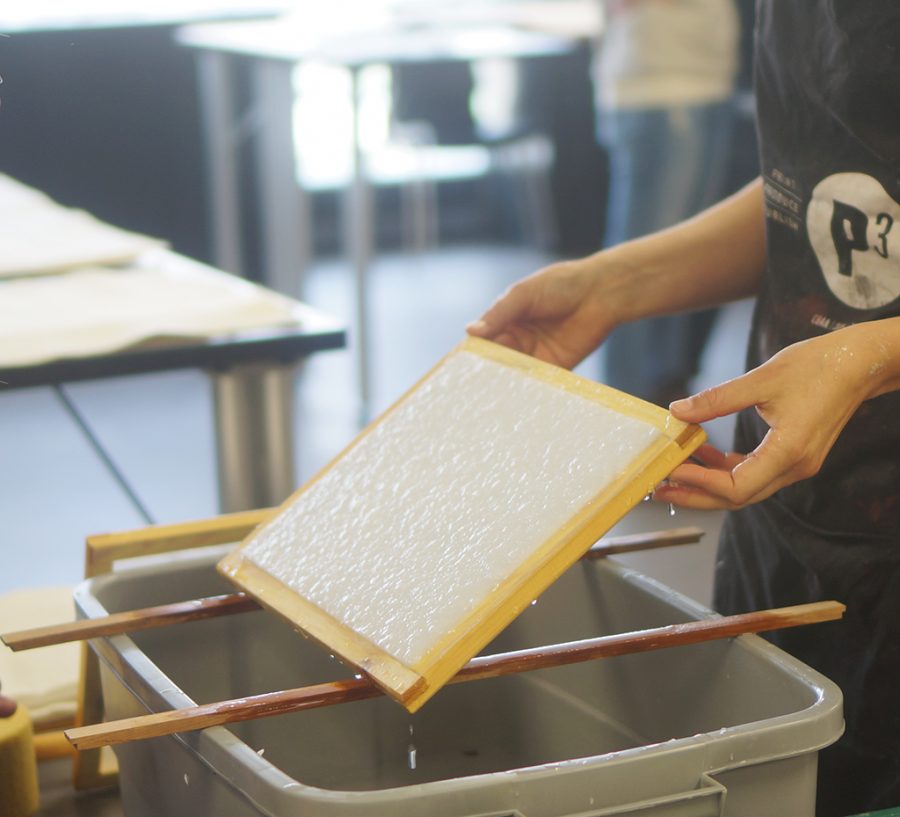 The pulp inside the mold and deckle that is used to create the paper at the U Book Arts Workshop on Friday, April 15, 2016. (Rishi Deka, Daily Utah Chronicle)