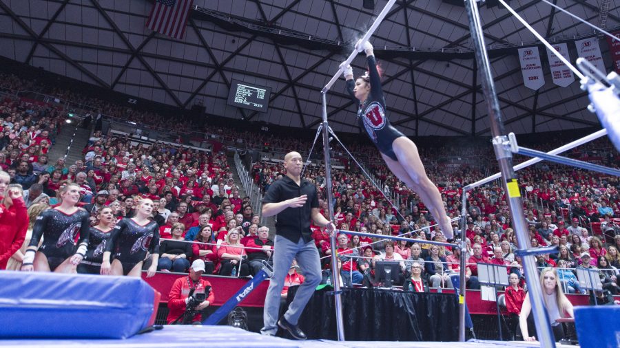 The University of Utah Womens Gymnastics sophomore Kari Lee flys through the air on the uneven bars in a meet with Stanford at the John M. Huntsman Center on Friday, March 3, 2017 (Kiffer Creveling | The Daily Utah Chronicle)