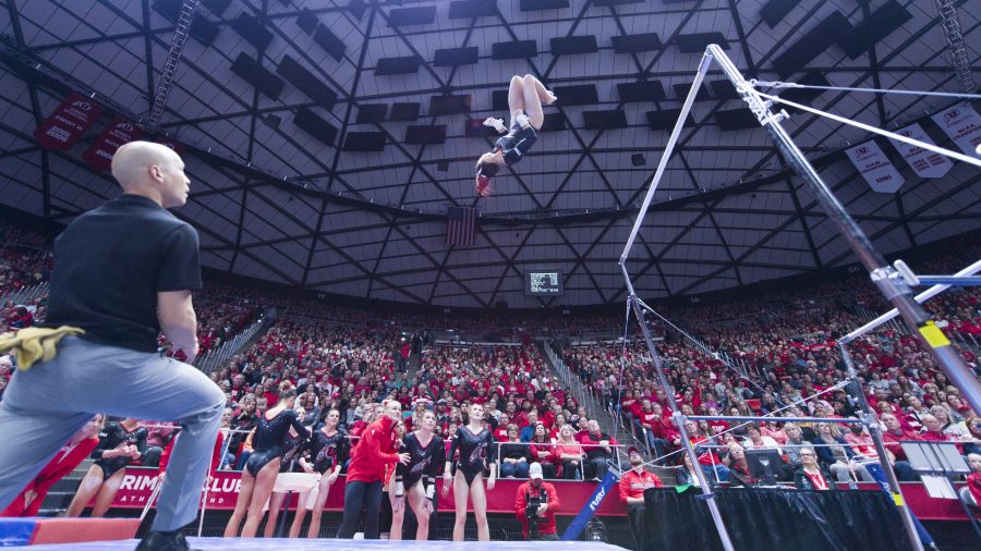 The University of Utah Womens Gymnastics sophomore Kari Lee flys through the air on the uneven bars in a meet with Stanford at the John M. Huntsman Center on Friday, March 3, 2017 (Kiffer Creveling | The Daily Utah Chronicle)
