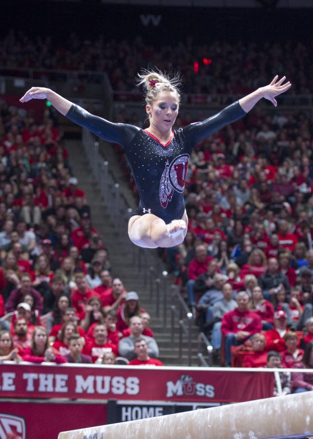 The University of Utah Womens Gymnastics freshman Mykayla Skinner flies through the air on the balance beam in a meet with Stanford at the John M. Huntsman Center on Friday, March 3, 2017 (Kiffer Creveling | The Daily Utah Chronicle)