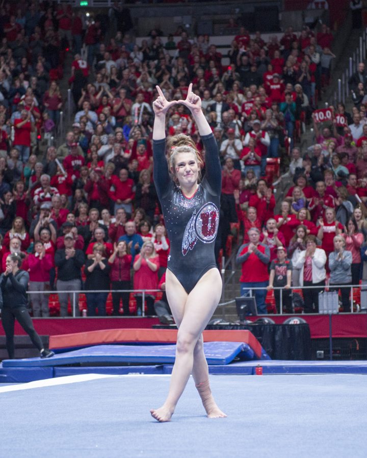 The University of Utah Womens Gymnastics senior Baely Rowe flashes the U and gets emotional after her final performance at the U in a meet with Stanford at the John M. Huntsman Center on Friday, March 3, 2017 (Kiffer Creveling | The Daily Utah Chronicle)