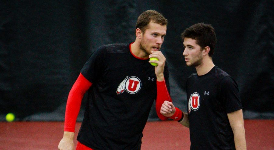 Utahs Egbert Weverink and David Micevski talk strategy during a doubles match against Montana State at the Eccles Tennis Center February 5, 2017. Michael Adam Fondren for the Daily Utah Chronicle.
